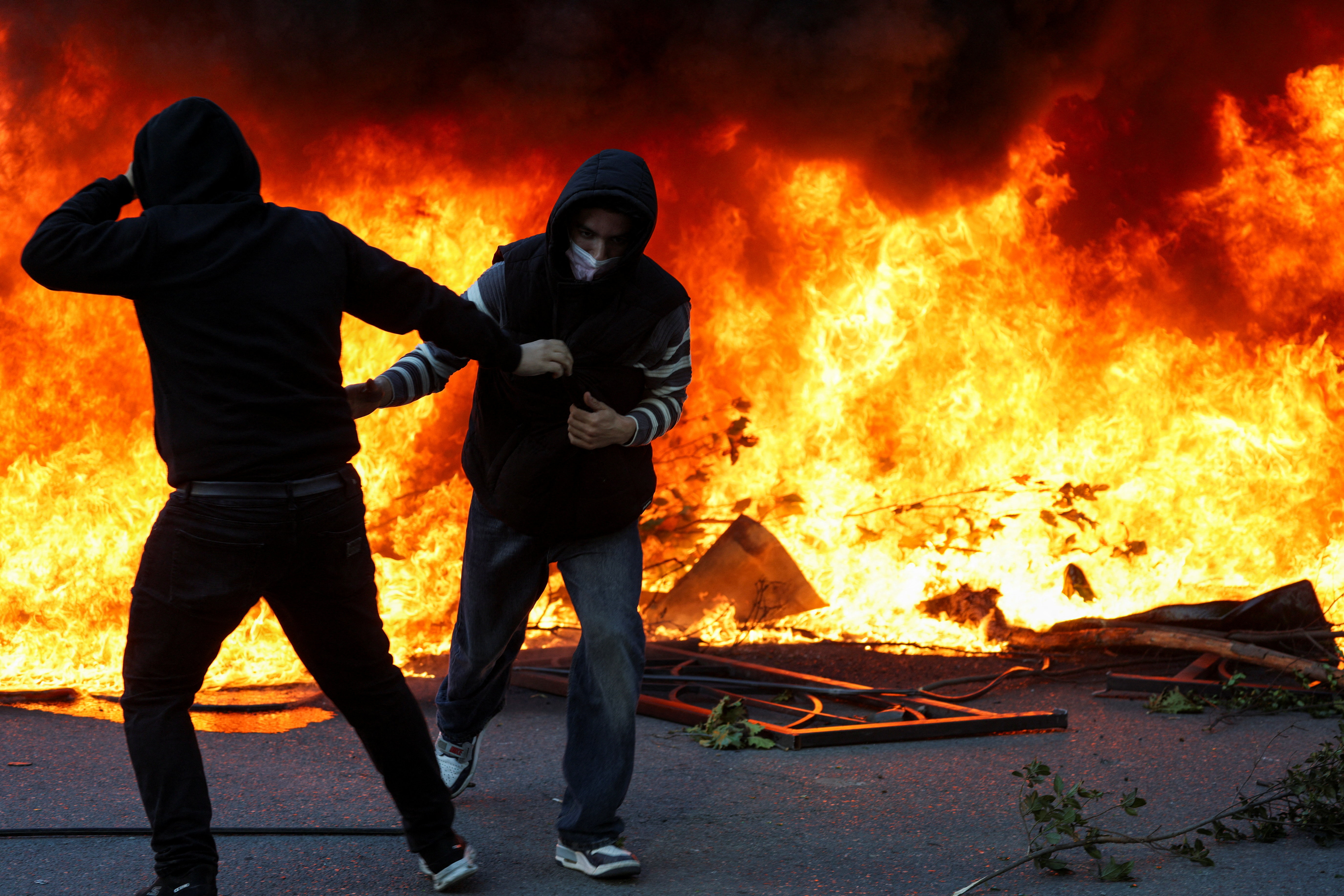 cover Buildings burn as Albania&#8217;s capital Tirana erupts into student violence