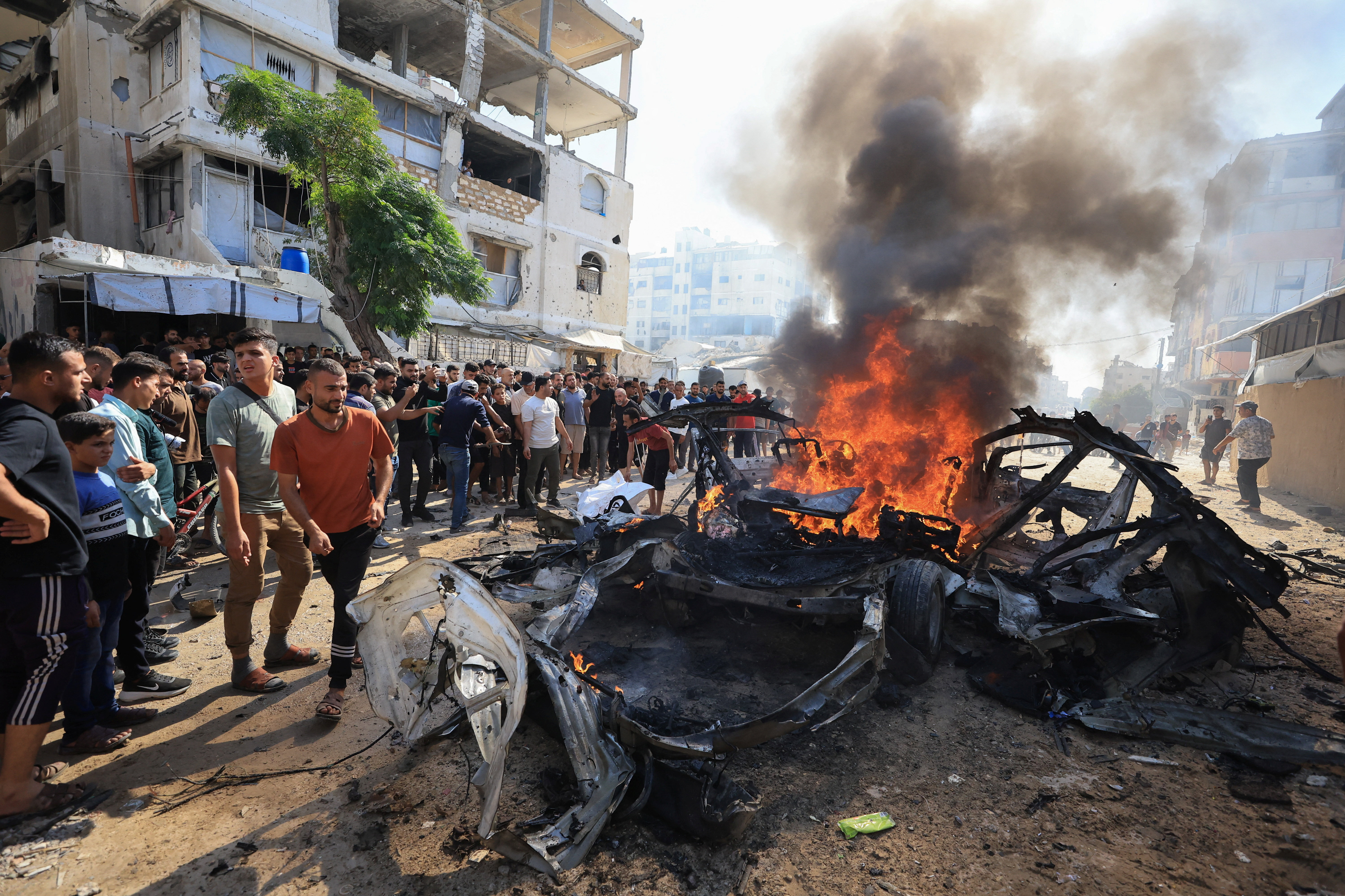 cover Israeli fire kills four people in Gaza, medics say