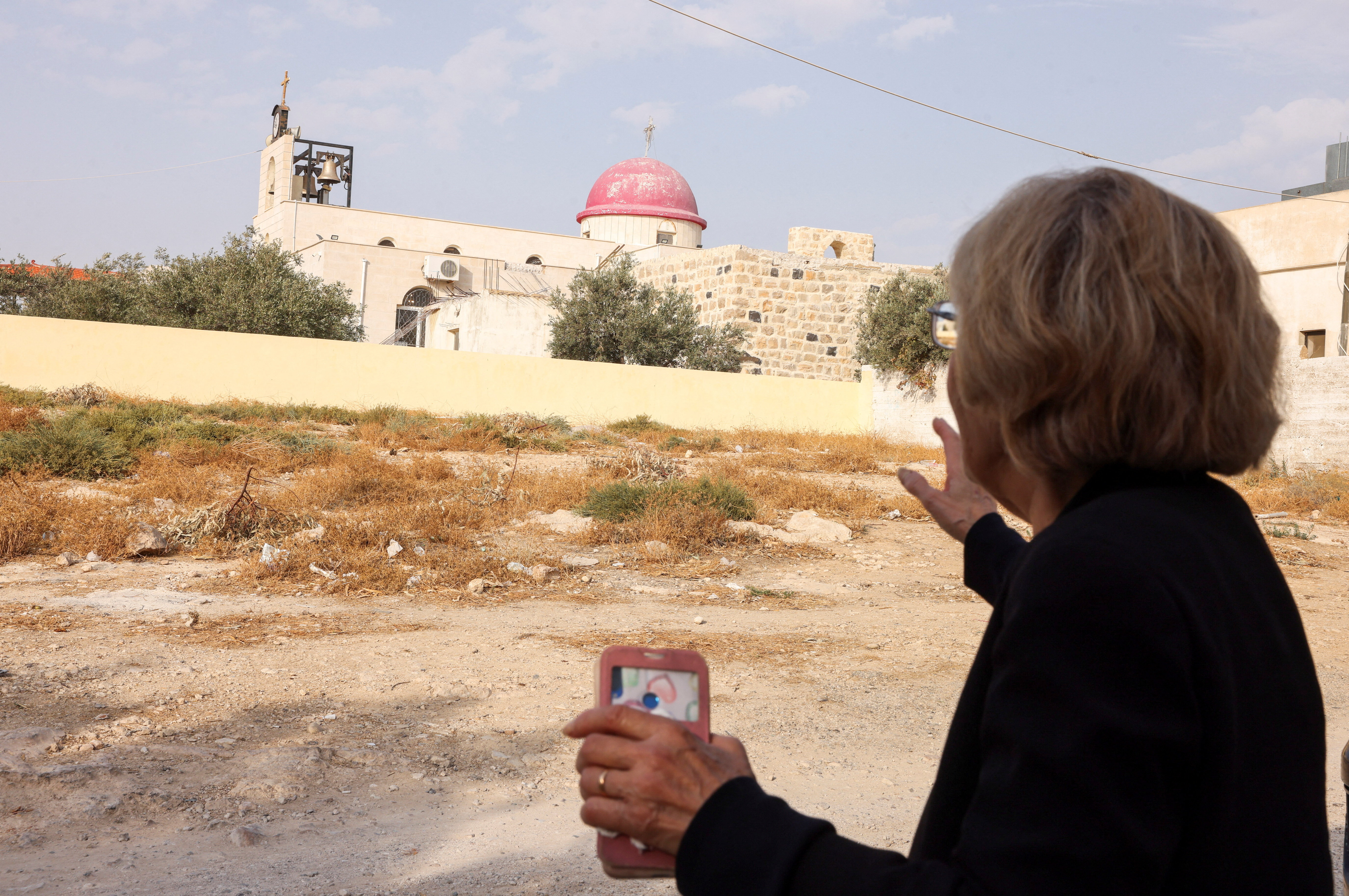 cover Jordan arrests three suspects in deadly church attack, state media says