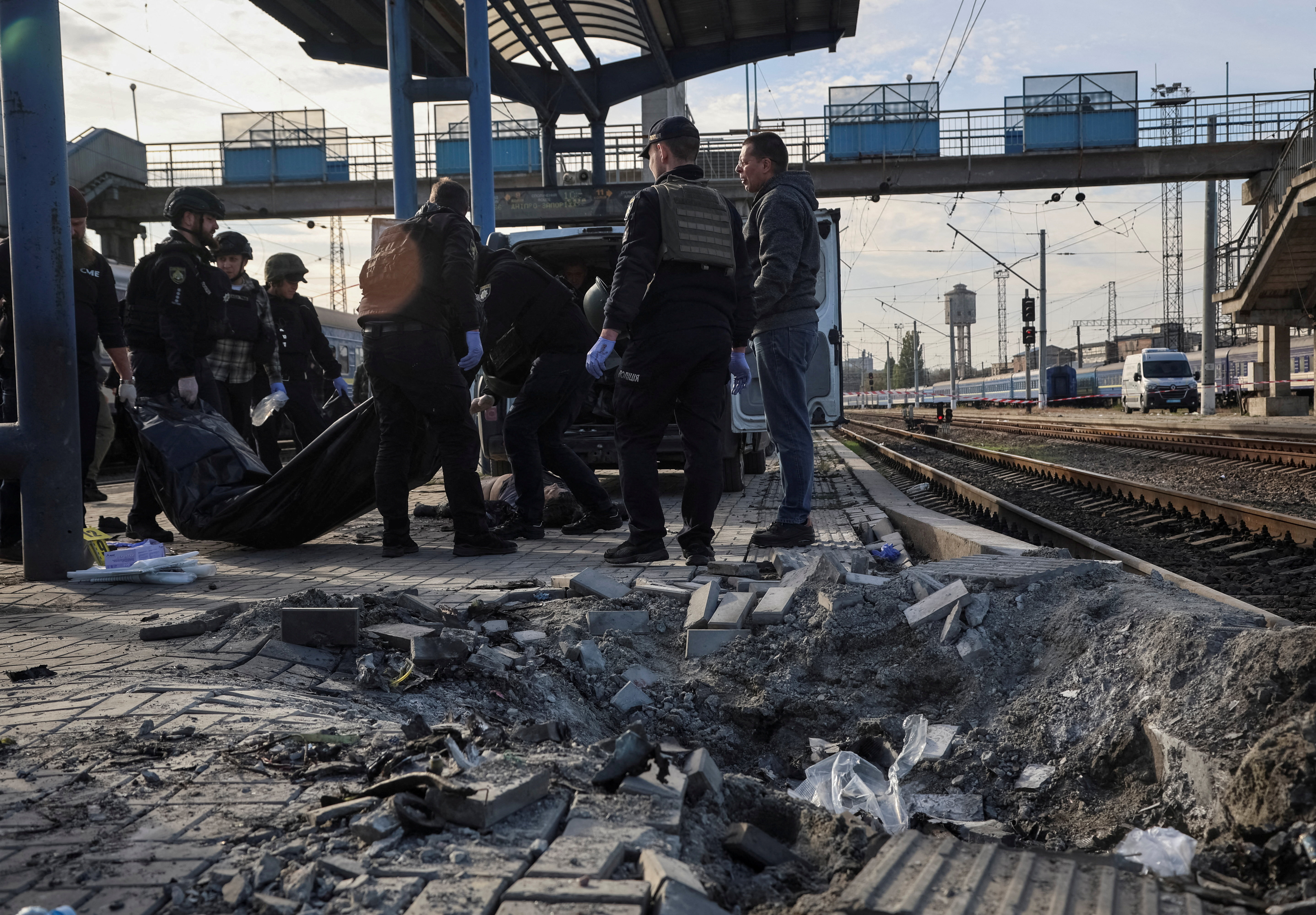 cover Russian drone strike kills 14 on Ukrainian rail platform