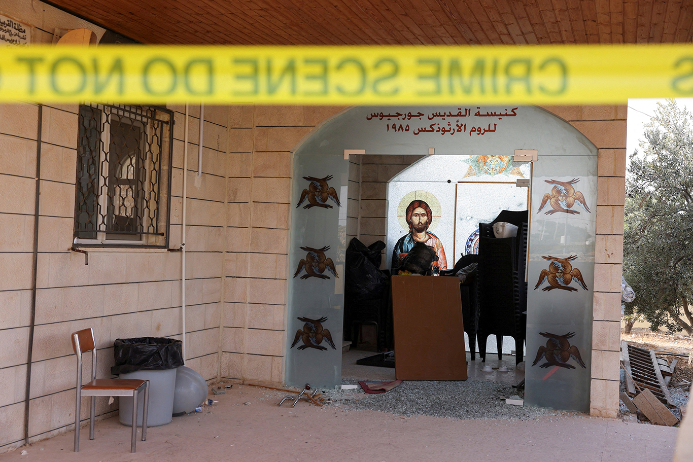 image Jordan tightens security after deadly church attack kills eight