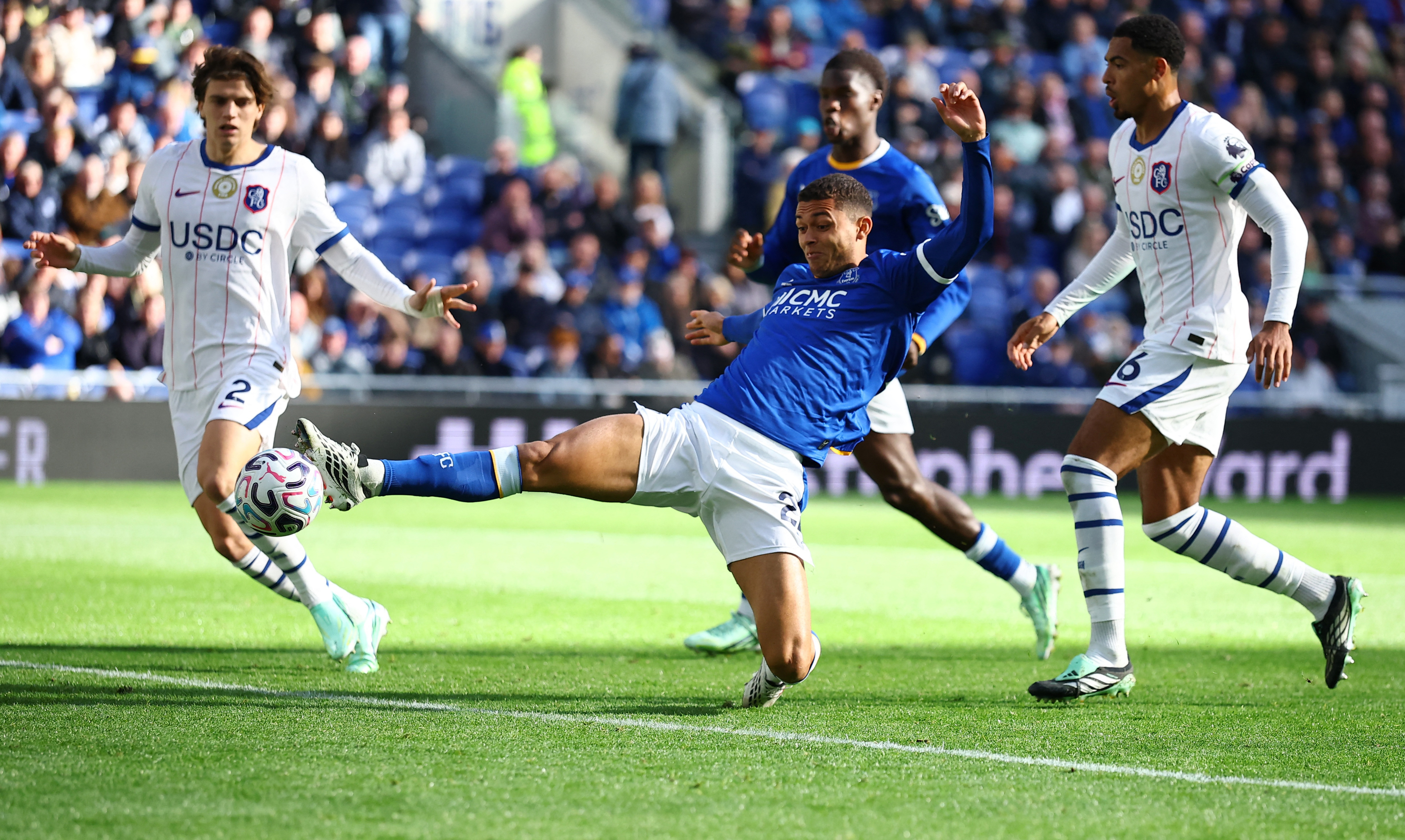 cover Neto double fires Chelsea past Everton but Martinez injury mars win