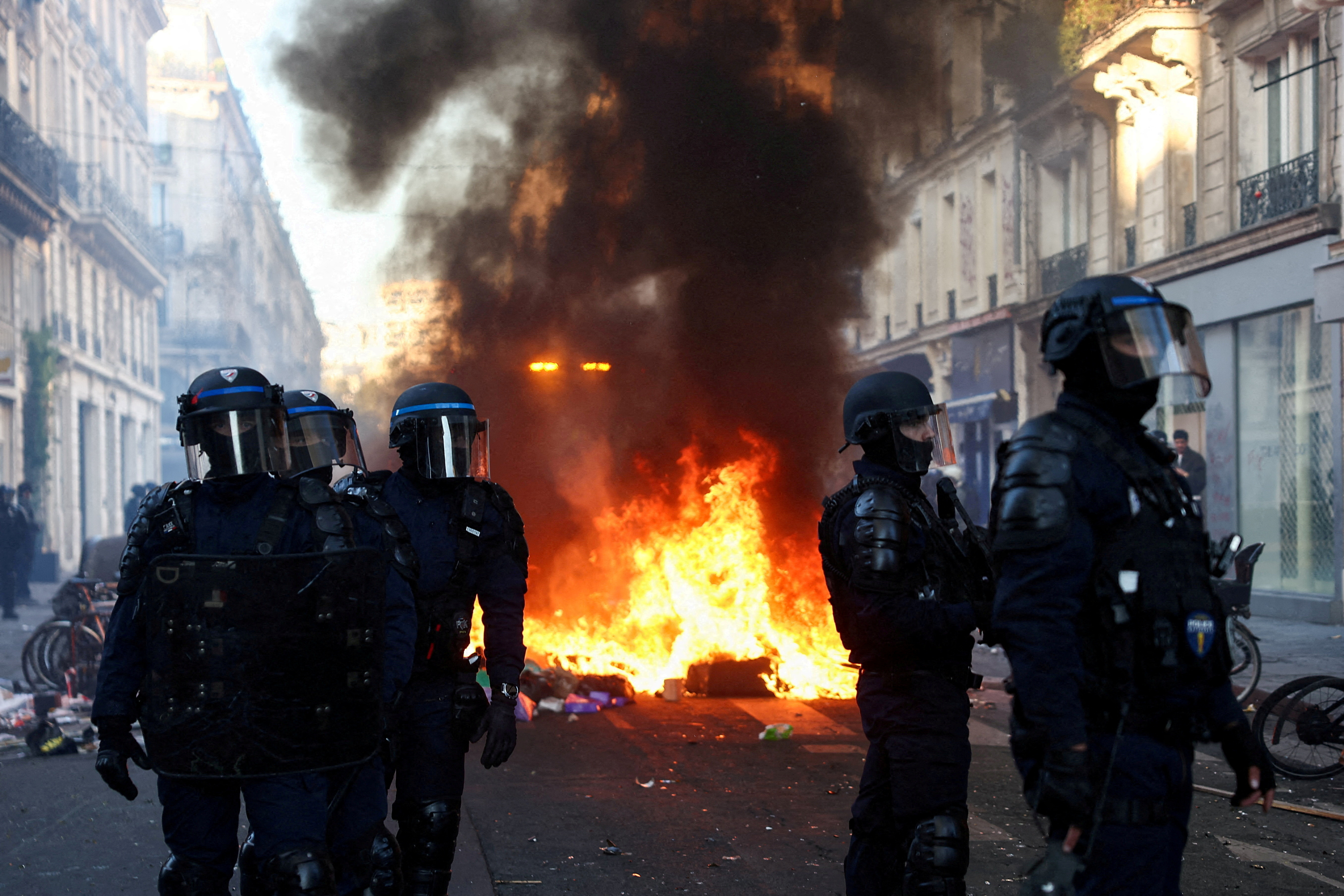 cover France calm under curfews as fresh protests loom