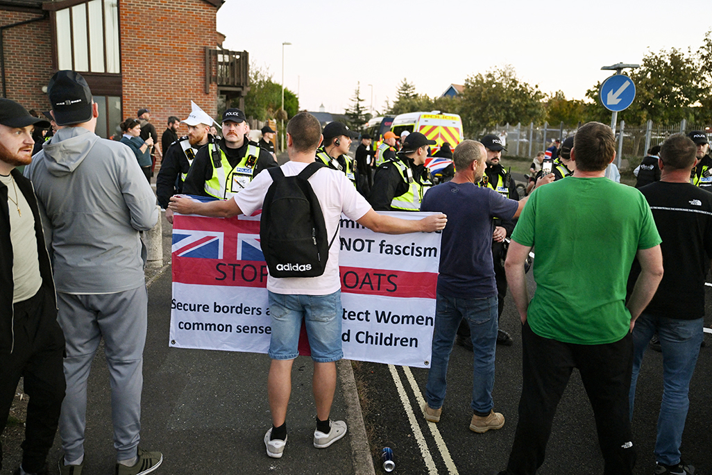 cover UK police make 12 arrests after anti-migrant protest