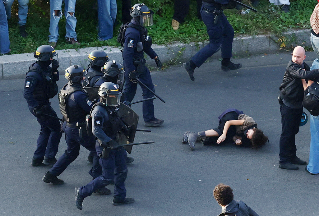 cover France suspends use of stun grenades to police student protests