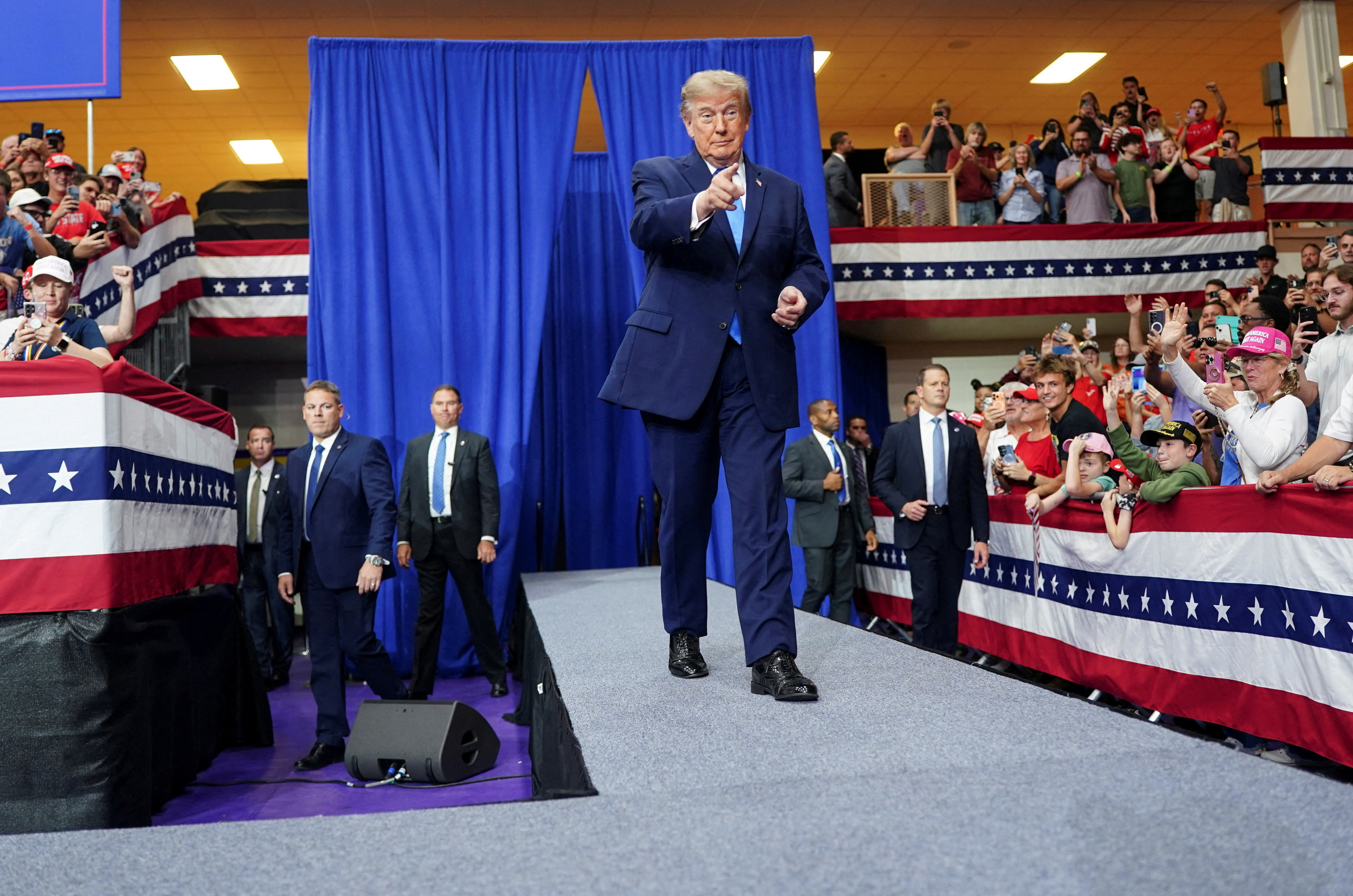 image In crude Ohio rally speech, Trump says he may not help if Democrats win
